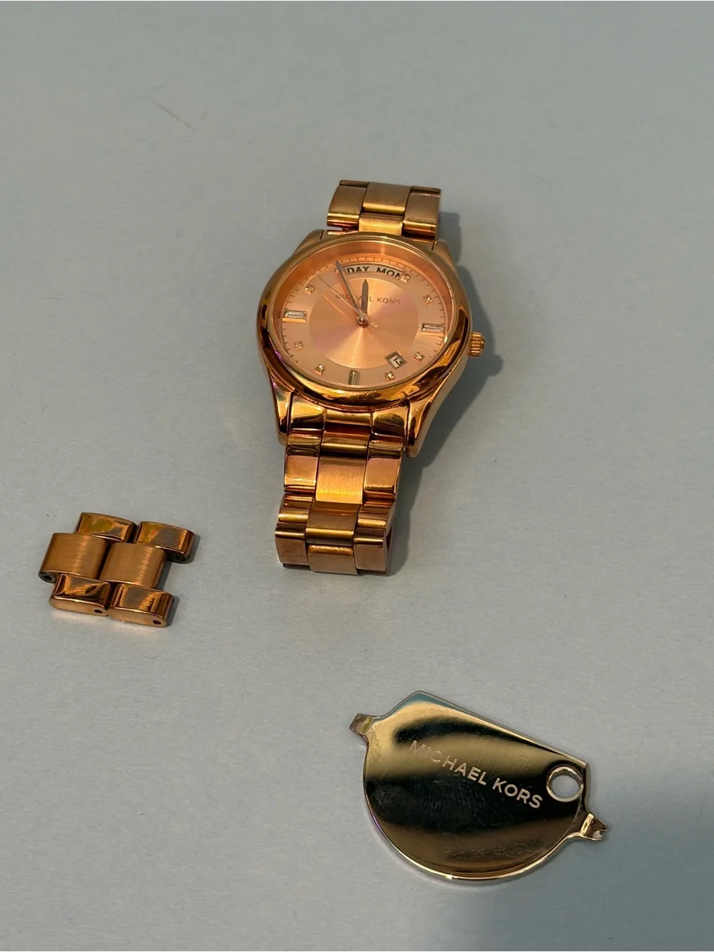 Michael Kors Gold-Tone Stainless Steel Watch with Day-Date Display